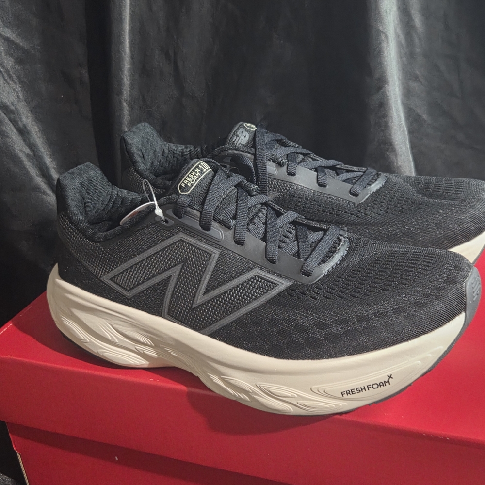 New Balance Women's Black and White Sneakers